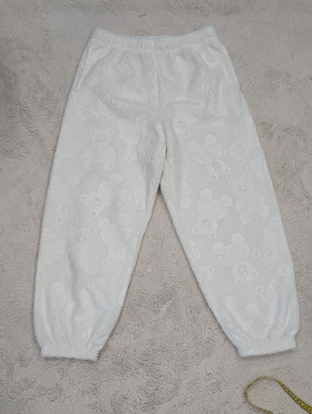 Urban Outfitters Cream Bear-Pattern Plush Joggers